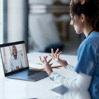 Two person talking through a video call