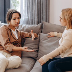 two female talking to each other