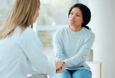 Two woman talking to each other